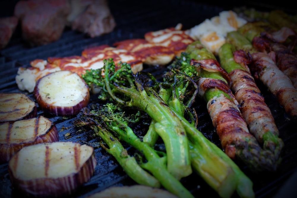grilled meat with green vegetable on top