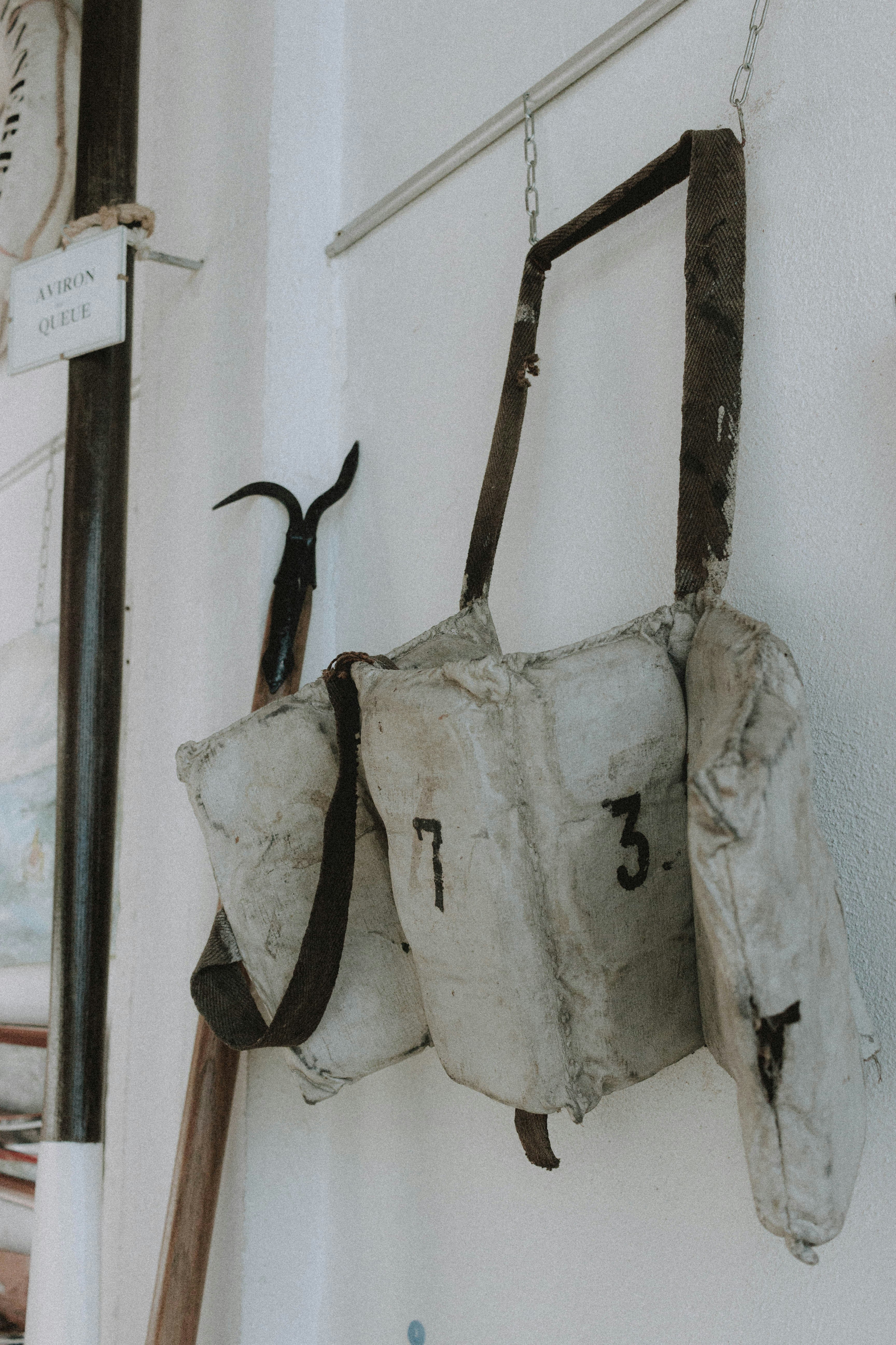 white and black sling bag