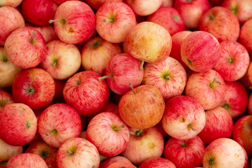 red apples on brown wooden table