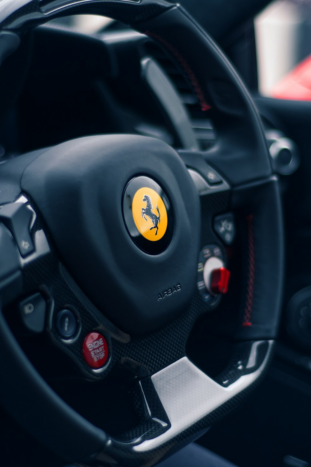 black and yellow bmw steering wheel