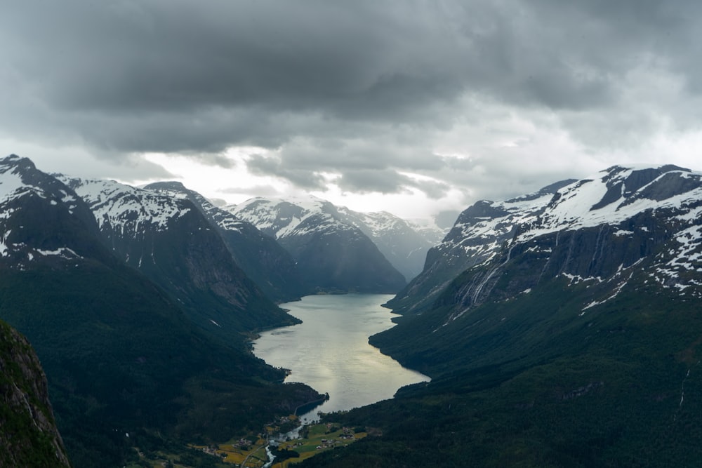 lake in the middle of mountains