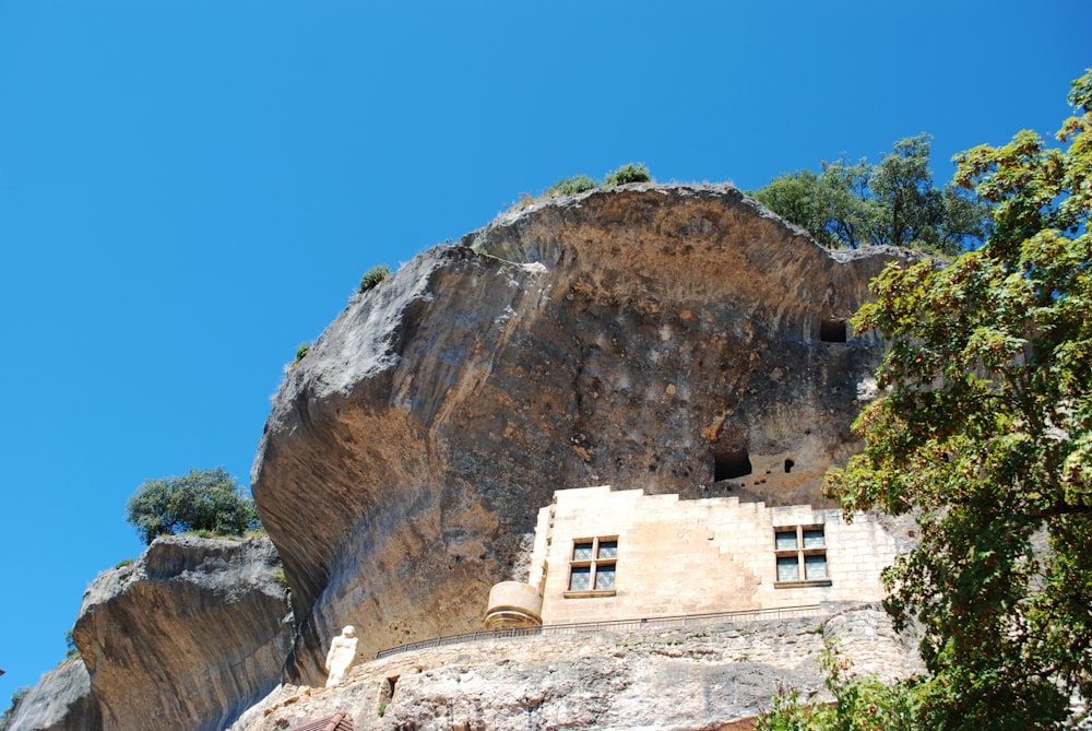 brown rock formation under blue sky during daytime