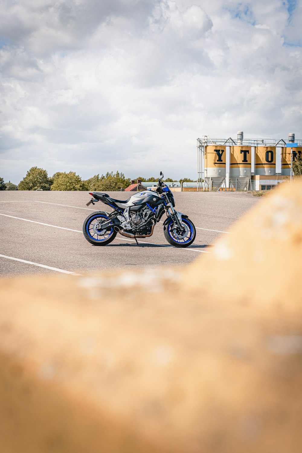 black and blue sports bike on road during daytime