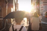 A cheerful group enjoying a sunset walk through charming city streets.