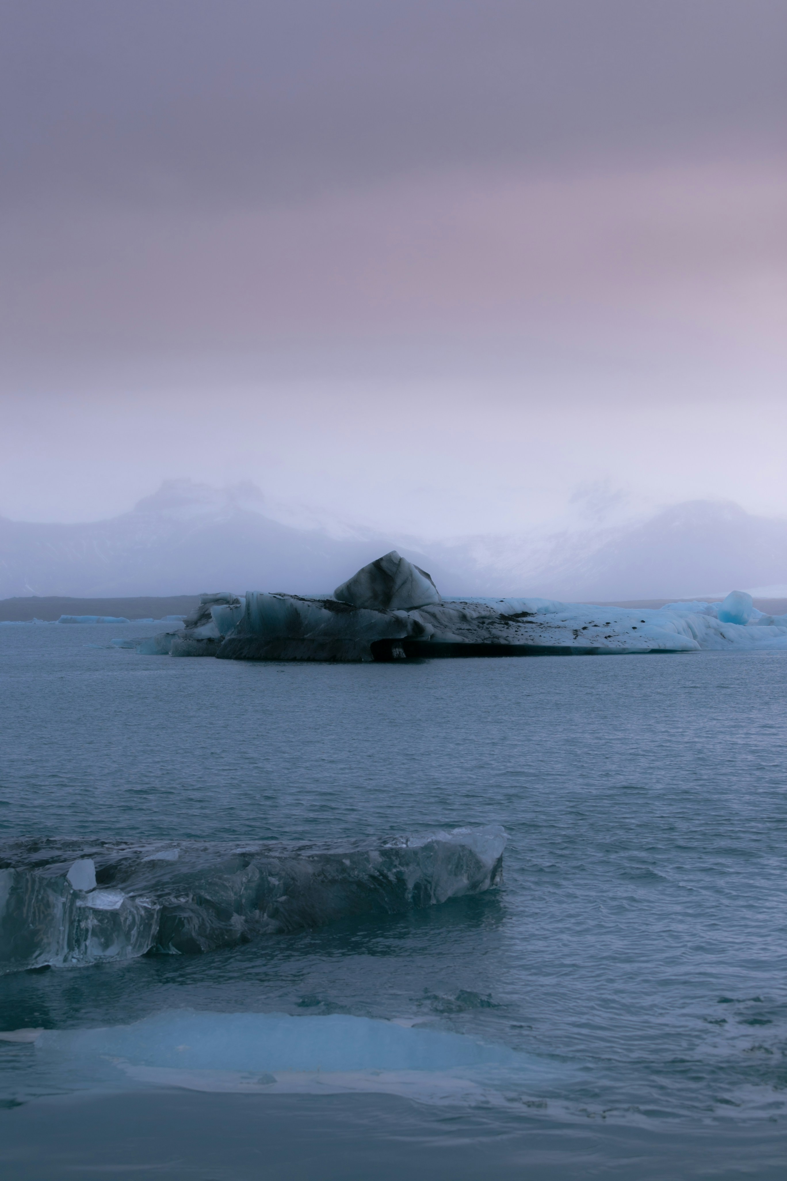 gray rock formation on sea during daytime