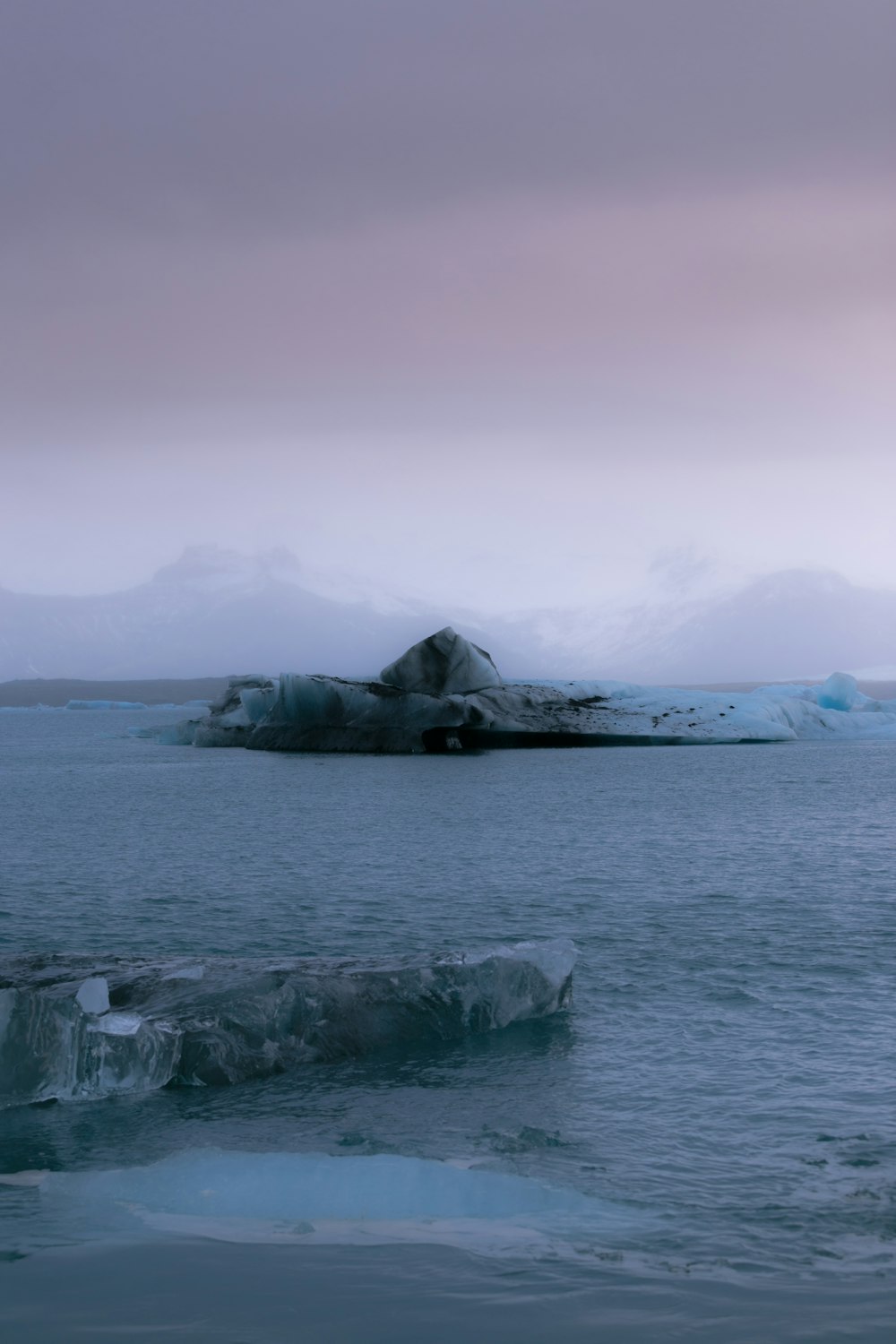 gray rock formation on sea during daytime