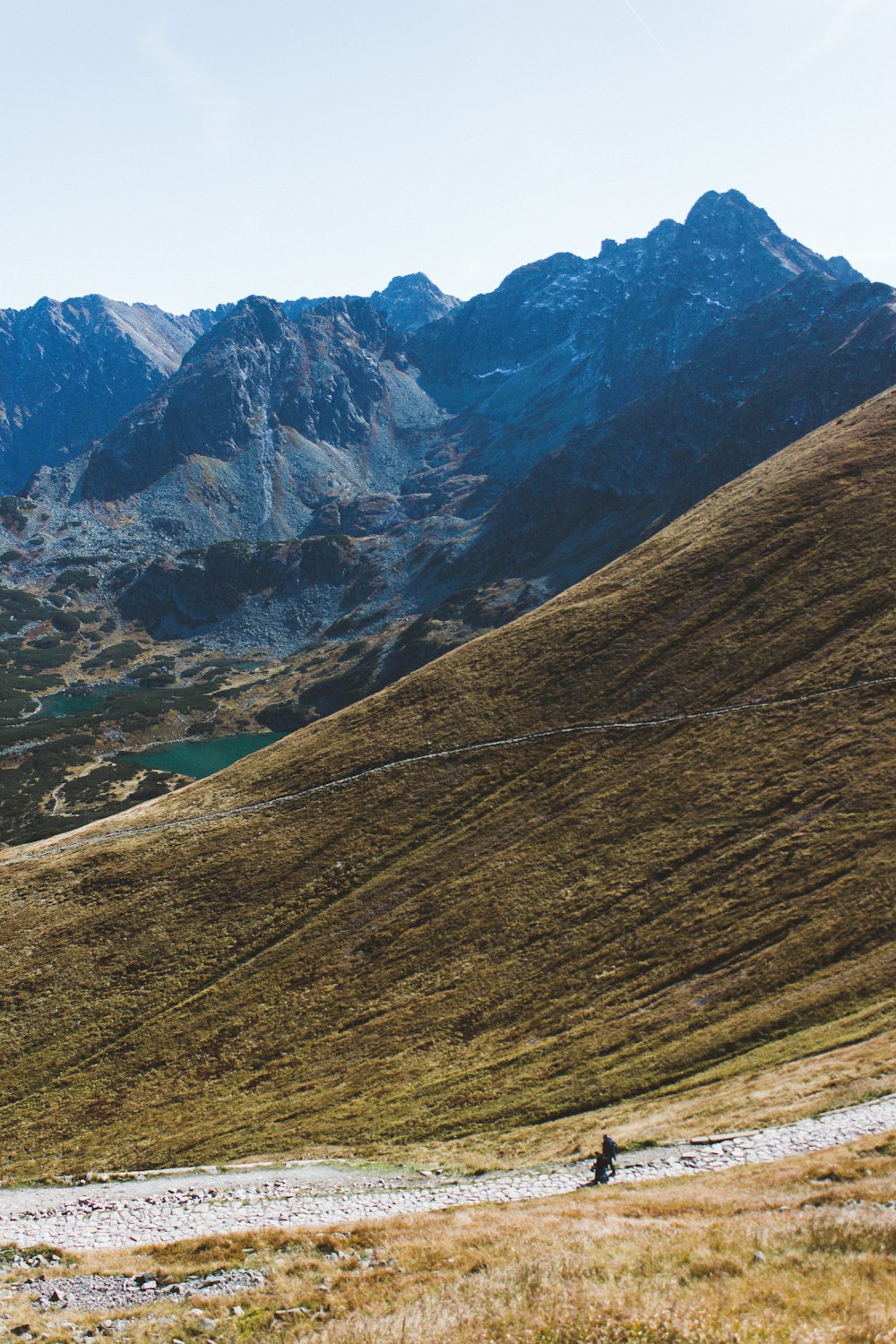 brown and green mountains under blue sky during daytime