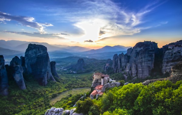Green trees and rocky mountains under blue sky during daytime — Meteora, Greece