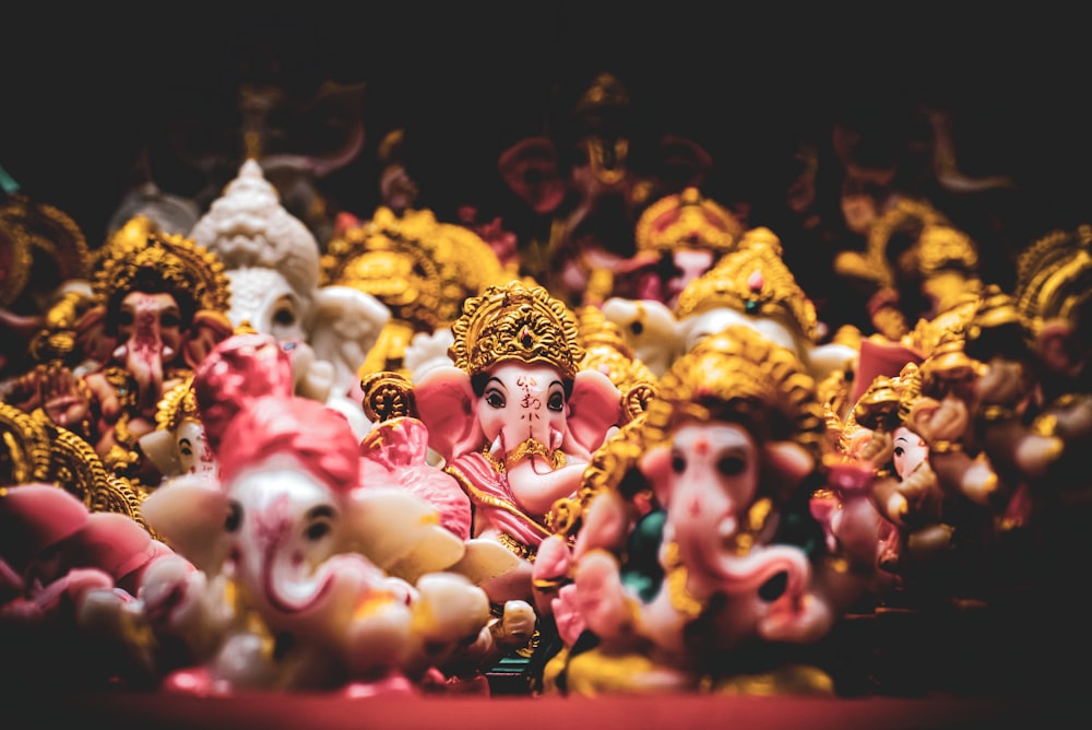 brown and white ceramic figurines