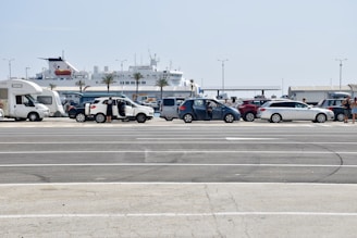 cars parked on parking lot during daytime