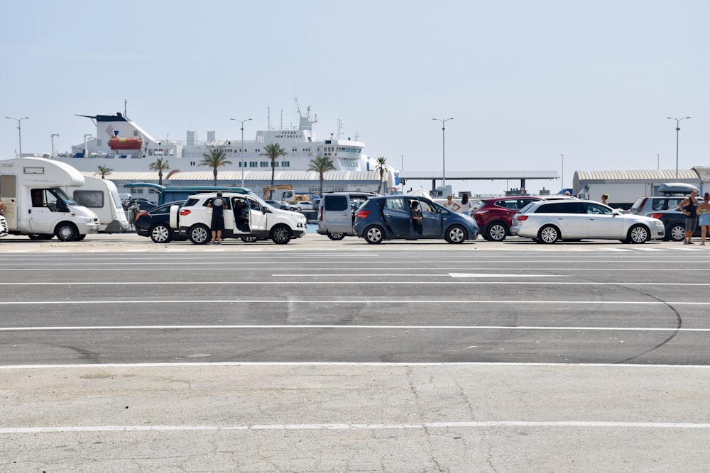 cars parked on parking lot during daytime