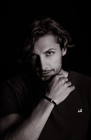 A classic black-and-white portrait of William Shakespeare, capturing his thoughtful gaze.