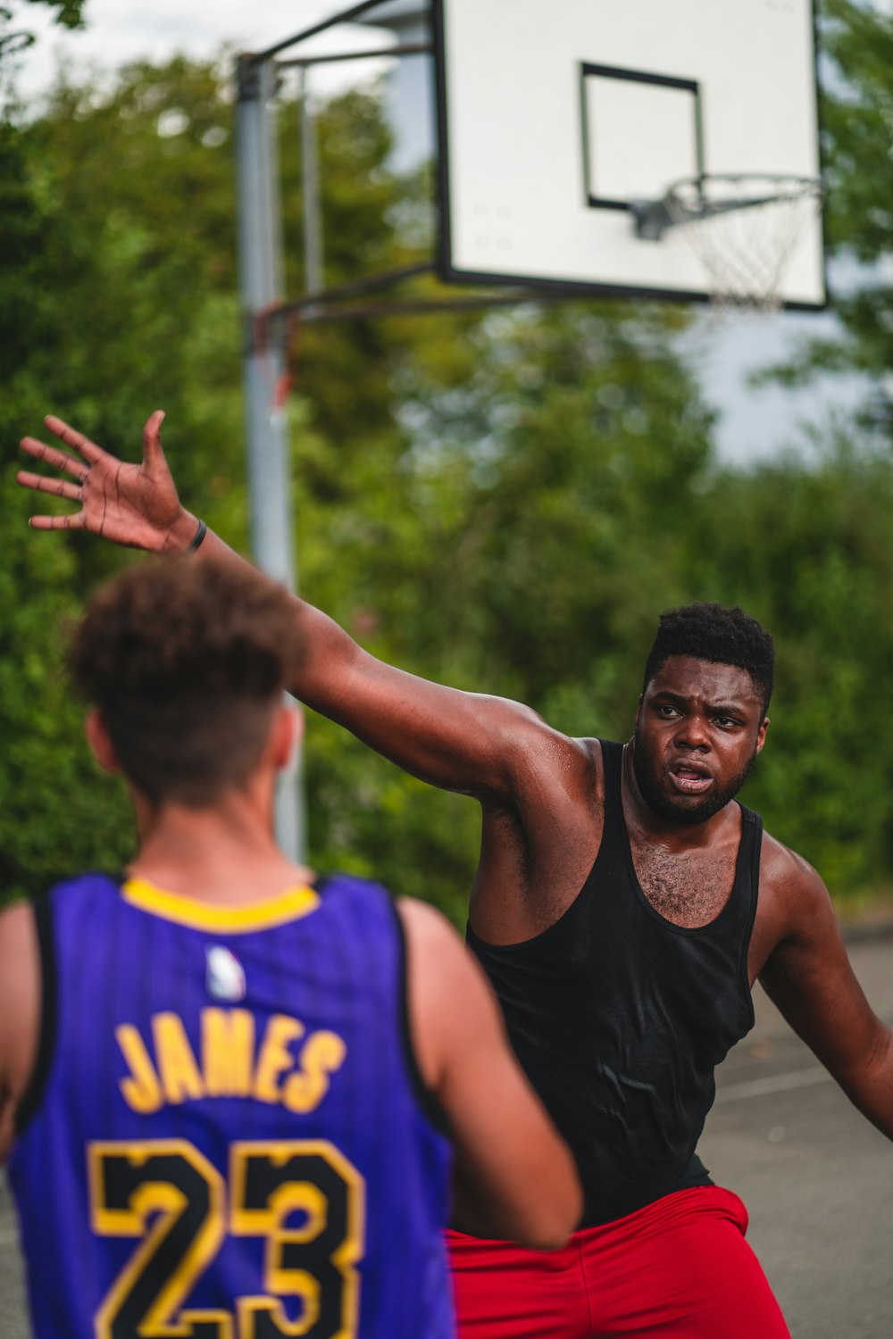 man in black tank top