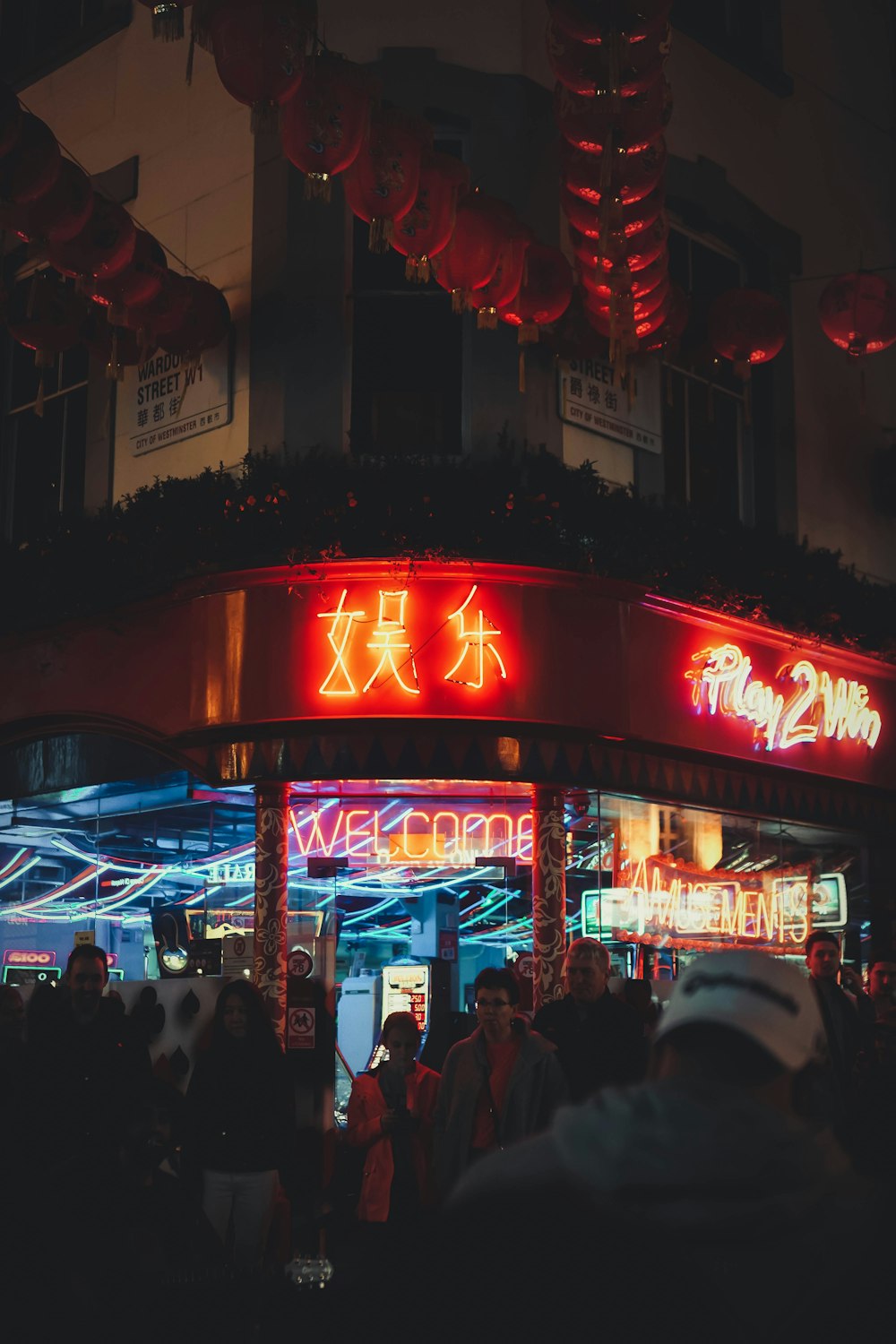 people walking on street during night time