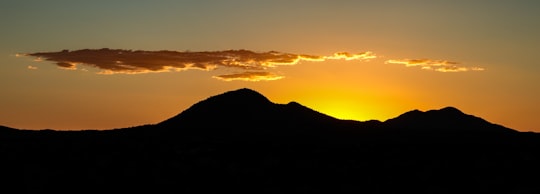 silhouette of mountain during sunset in Cerrillos United States