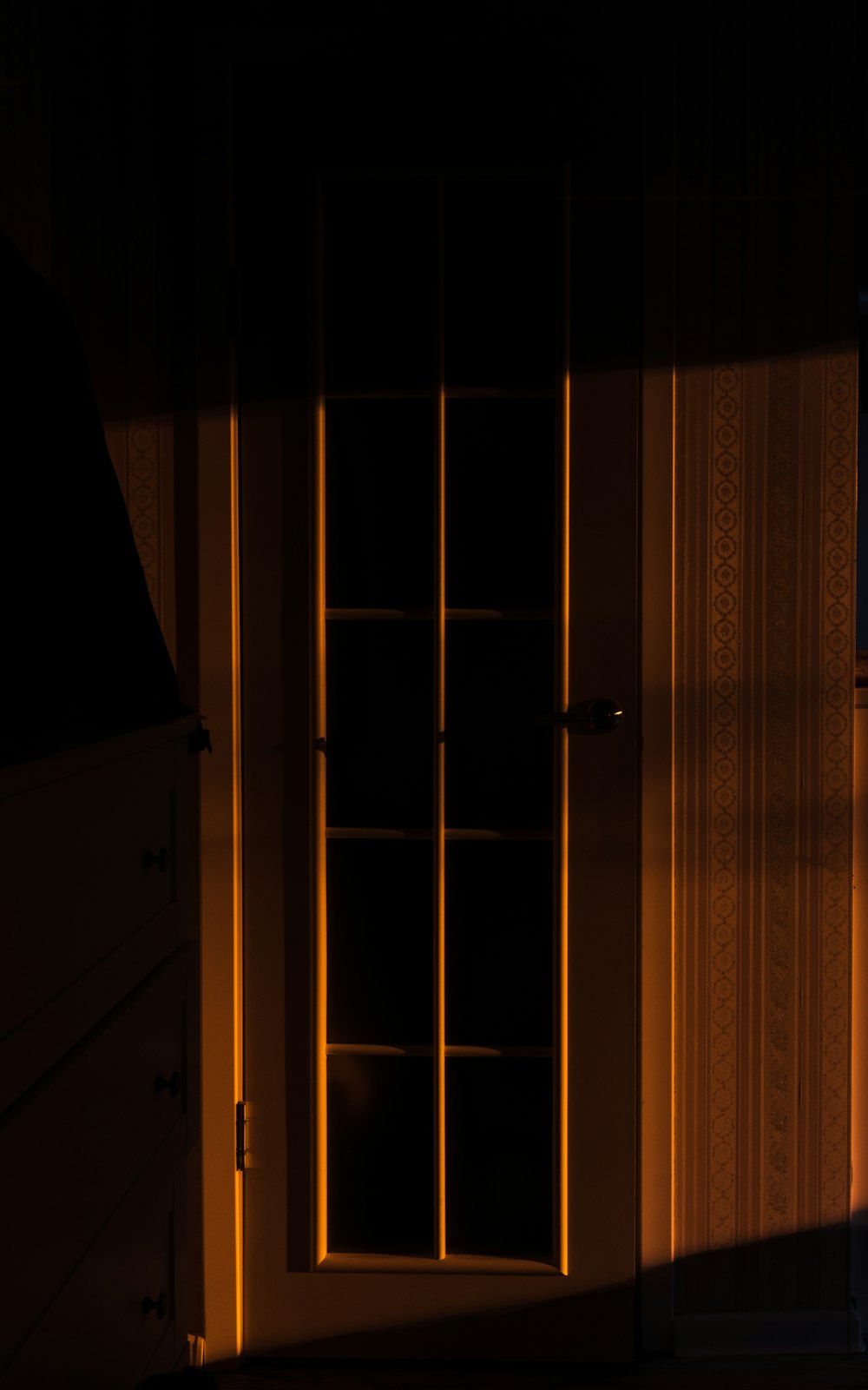 brown wooden framed glass door