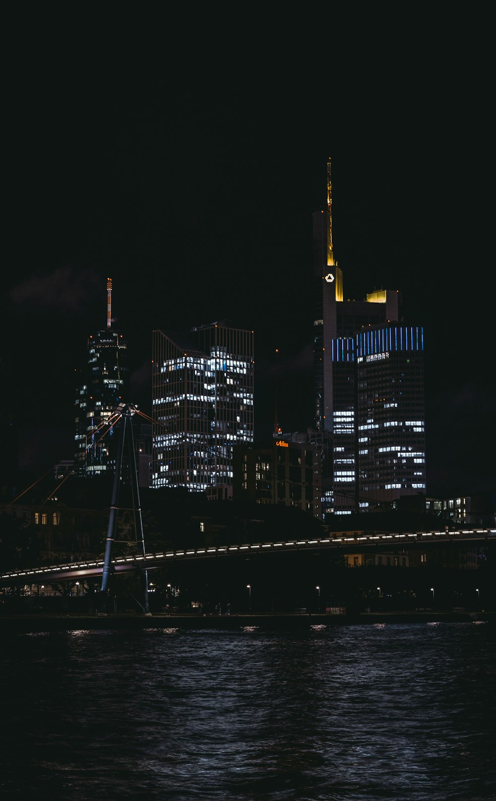 black and white concrete building during night time