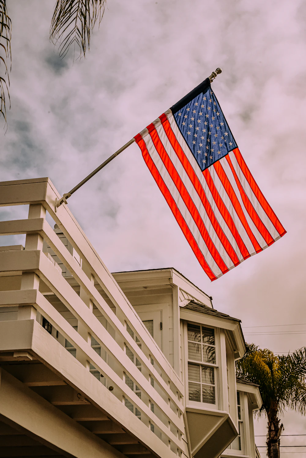 Flag flying on a suburban porch