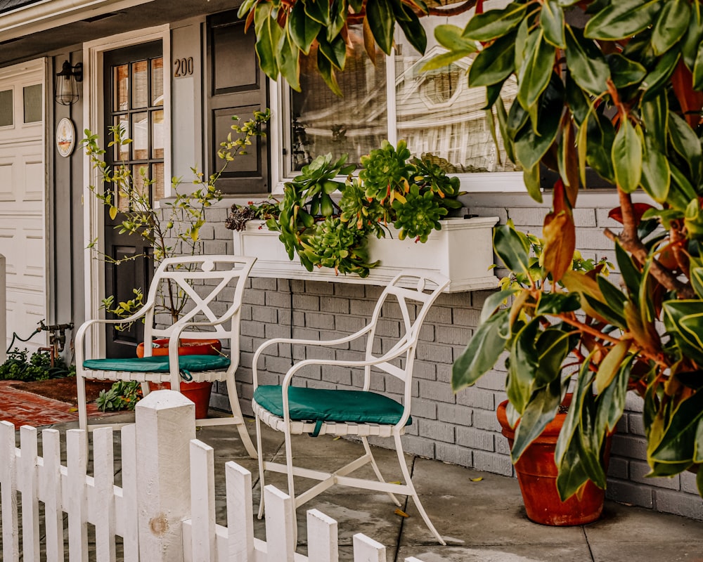 green and white metal chairs and tables