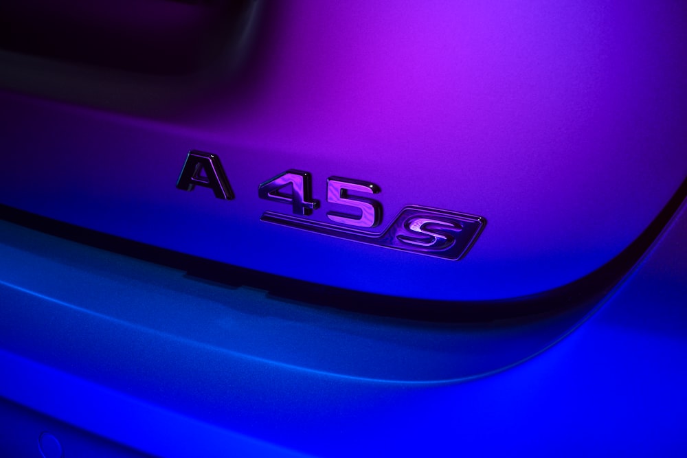 a close up of a purple and blue car