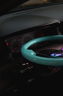 Close-up of a car dashboard with thin, precise lines and tiny icons glowing subtly