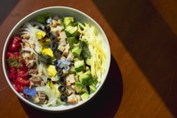 vegetable salad in white ceramic bowl