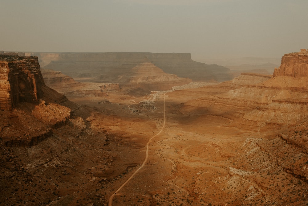 brown rocky mountain under gray sky during daytime