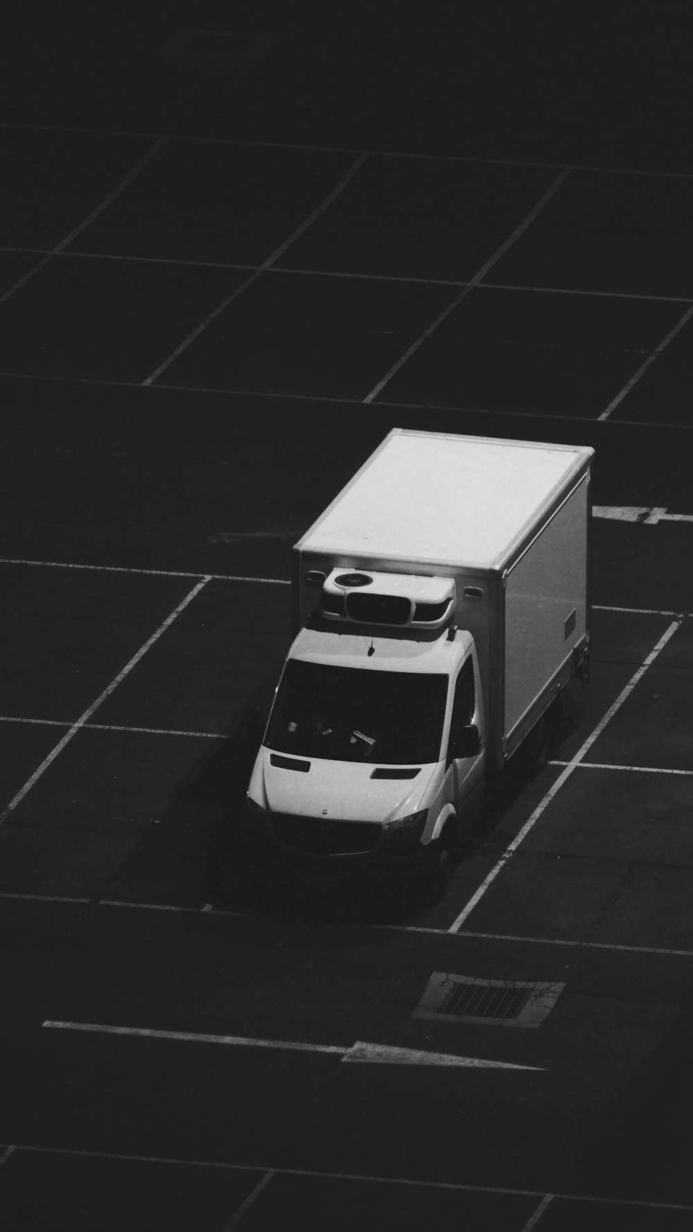 white car in grayscale photography