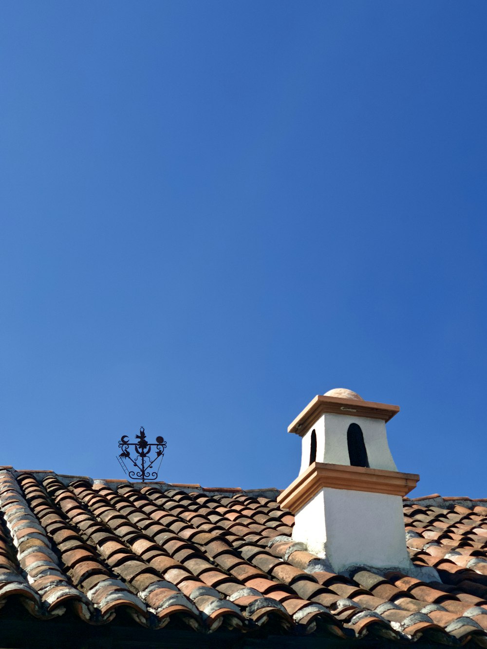 white and brown concrete building under blue sky during daytime