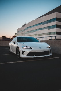 Stylish sports car parked in an urban setting after styling.