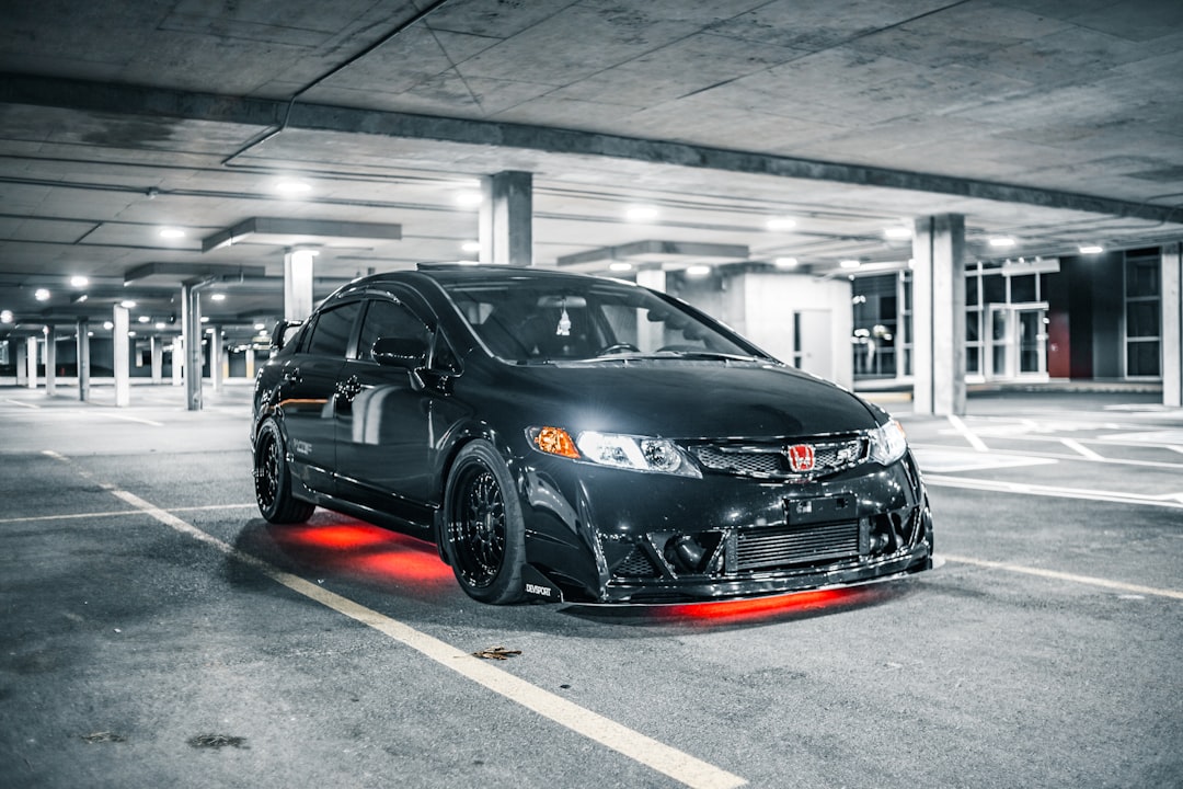 black bmw m 3 coupe parked in garage