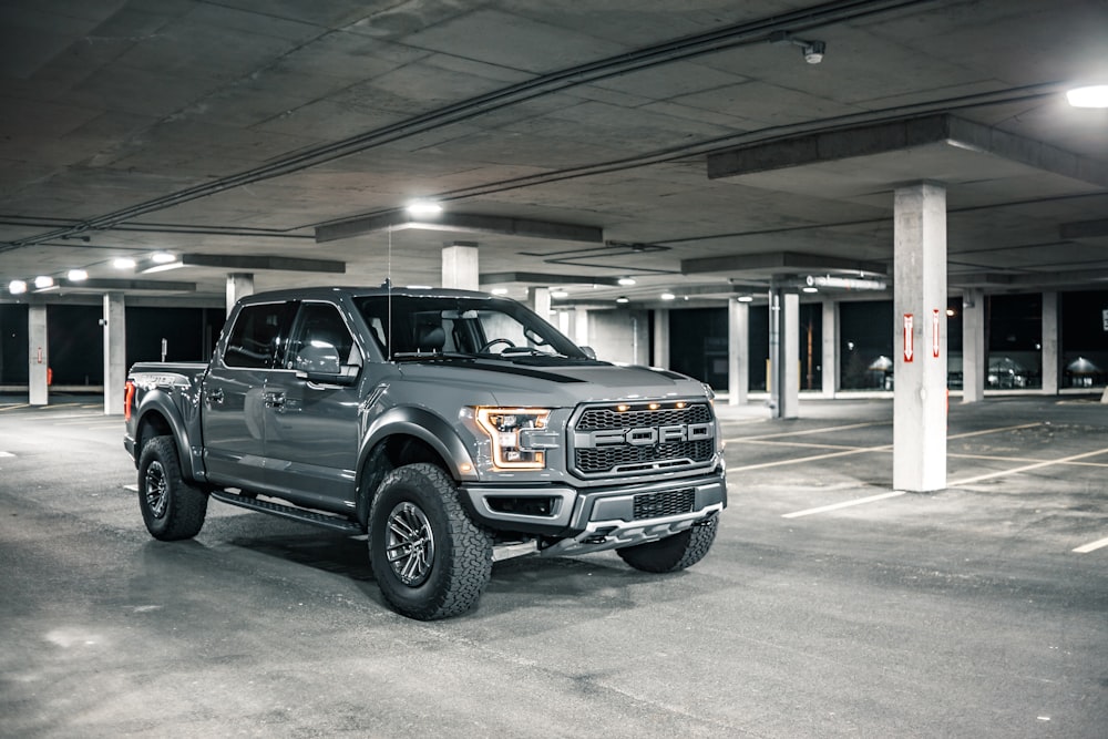 black suv in a garage