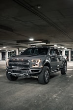 black suv in a garage