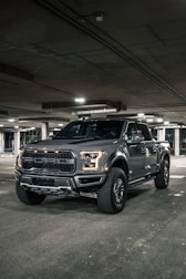 black suv in a garage