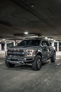 black suv in a garage