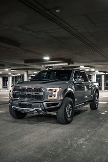 black suv in a garage