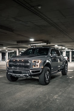 black suv in a garage