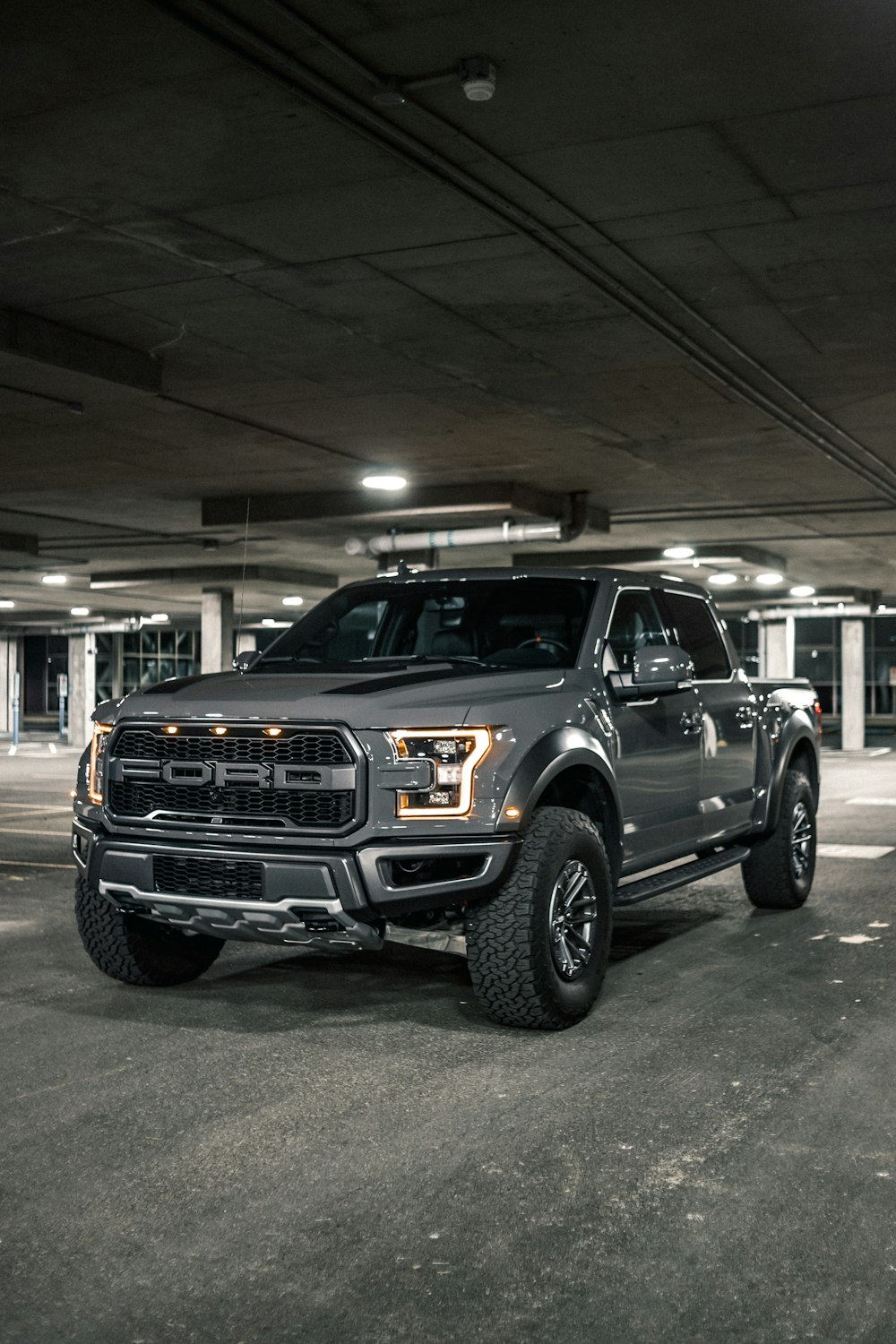 black suv in a garage