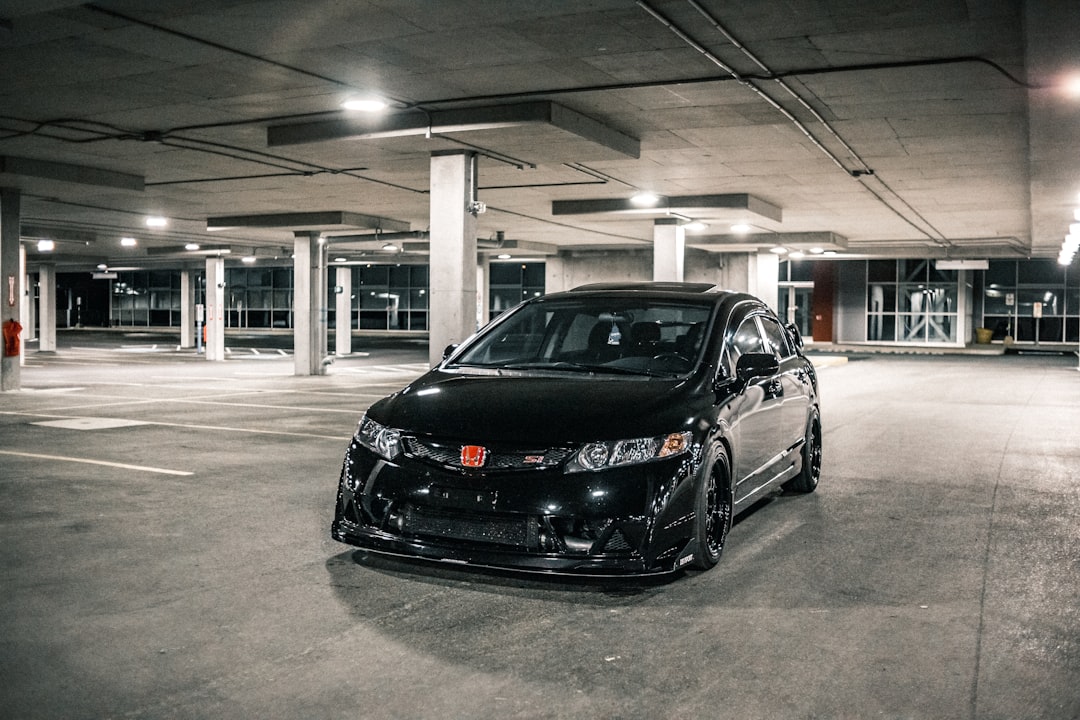 black bmw m 3 parked in parking lot