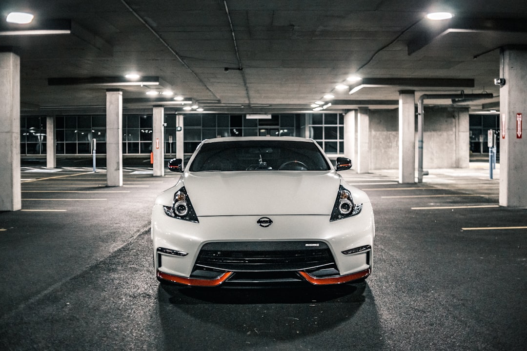 white honda car parked in garage