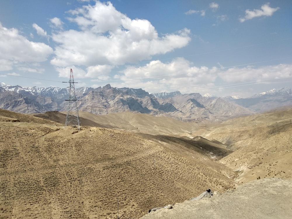 cable cars over the mountains during daytime