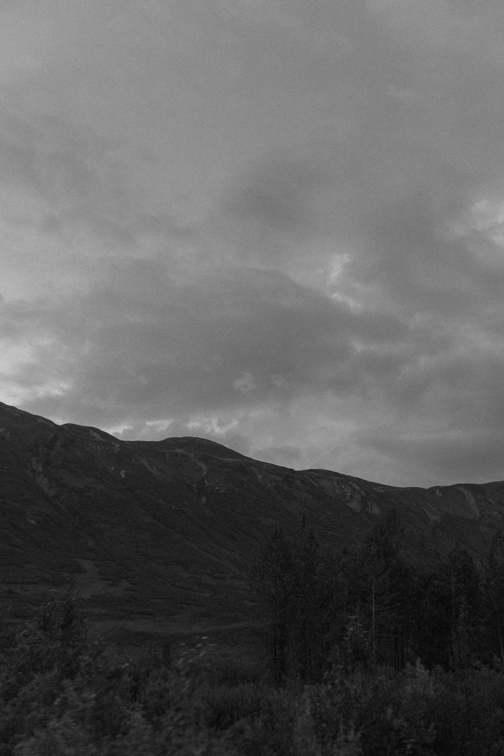 grayscale photo of mountain range