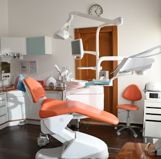 red and white massage chair dental office cleaning services