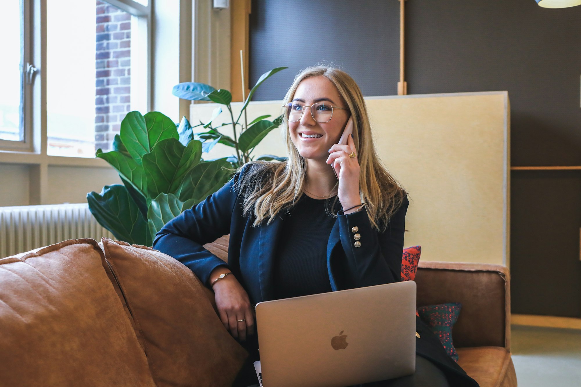 Mental Health Support Worker Happily Talking on Phone