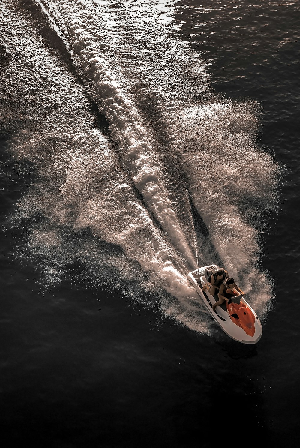 white and brown boat on water during daytime