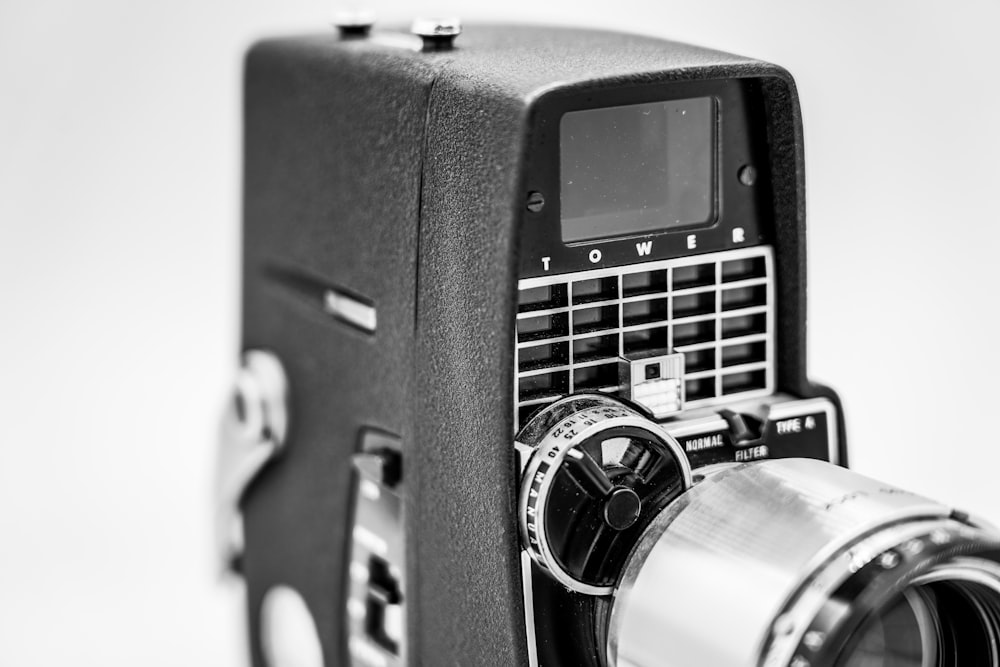 black and silver camera in grayscale photography