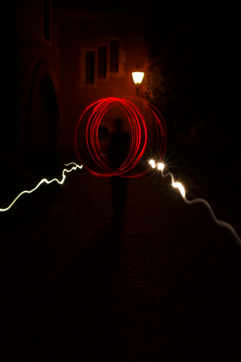 red light in tunnel during night time