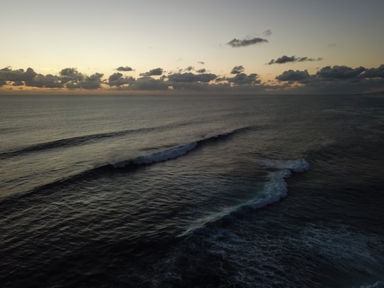 ocean waves crashing on shore during sunset in Western Australia Australia