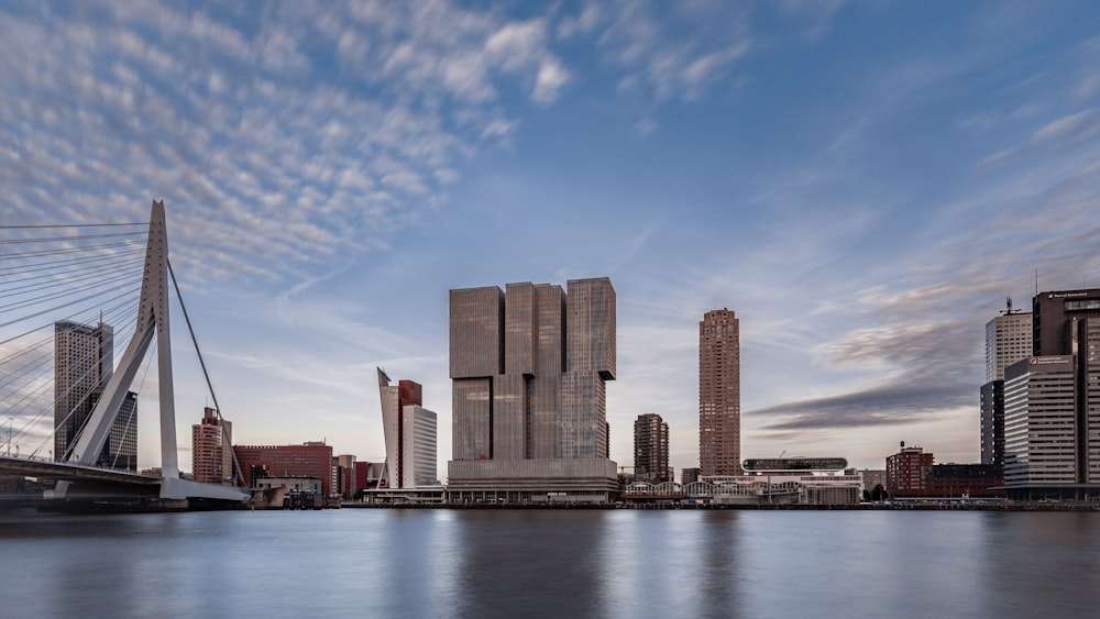 city skyline across body of water during daytime