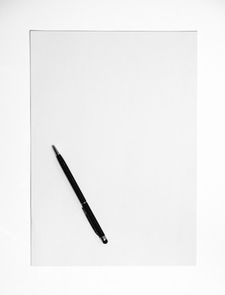 black pen on white surface